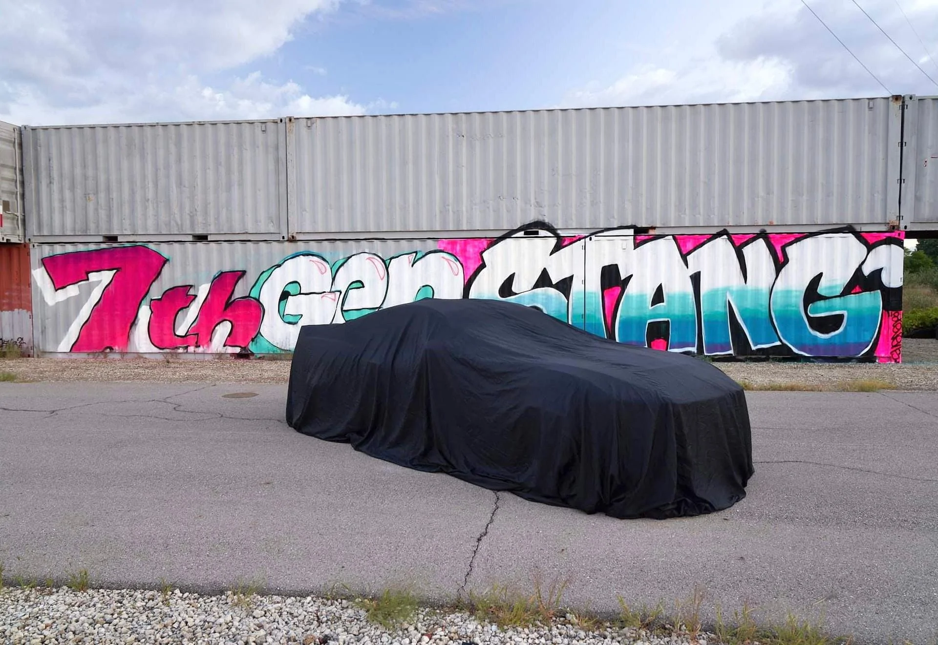 S650 Mustang New 7th gen Mustang teaser image with ducktail spoiler under cover! 2024-Ford-Mustang-1-1