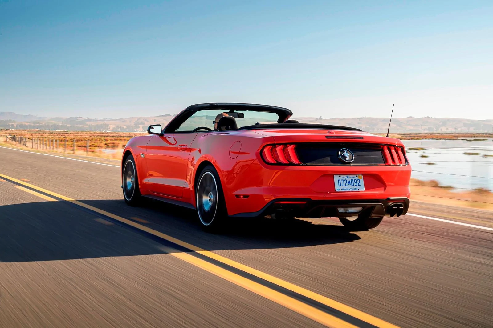 2018-ford-mustang-convertible-rear-view-driving-carbuzz-630767-1600.webp