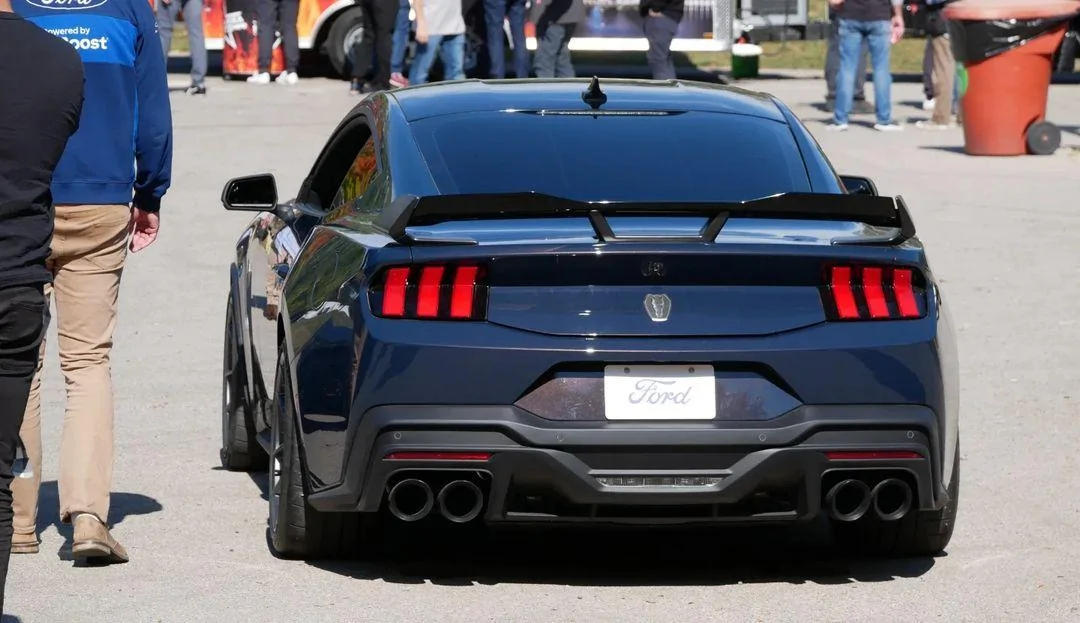 S650 Mustang Shadow Black Dark Horse and Grabber Blue Mustang GT S650 spotted at Flat Rock Assembly Plant Shadow Black Mustang Dark Horse rear