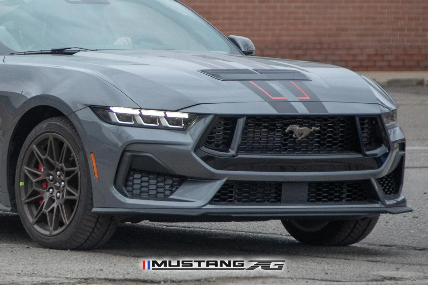 2024-mustang-gt-carbonized-gray-bronze-package-black-red-racing-stripes-3.jpg