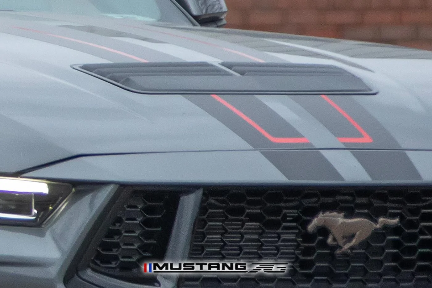 2024-mustang-gt-carbonized-gray-bronze-package-black-red-racing-stripes-5.jpg