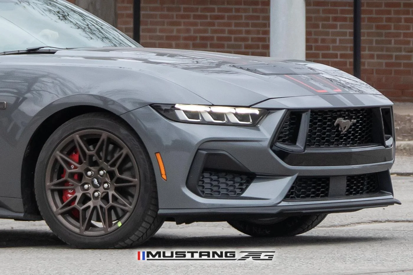 2024-mustang-gt-carbonized-gray-bronze-package-black-red-racing-stripes-8.jpg