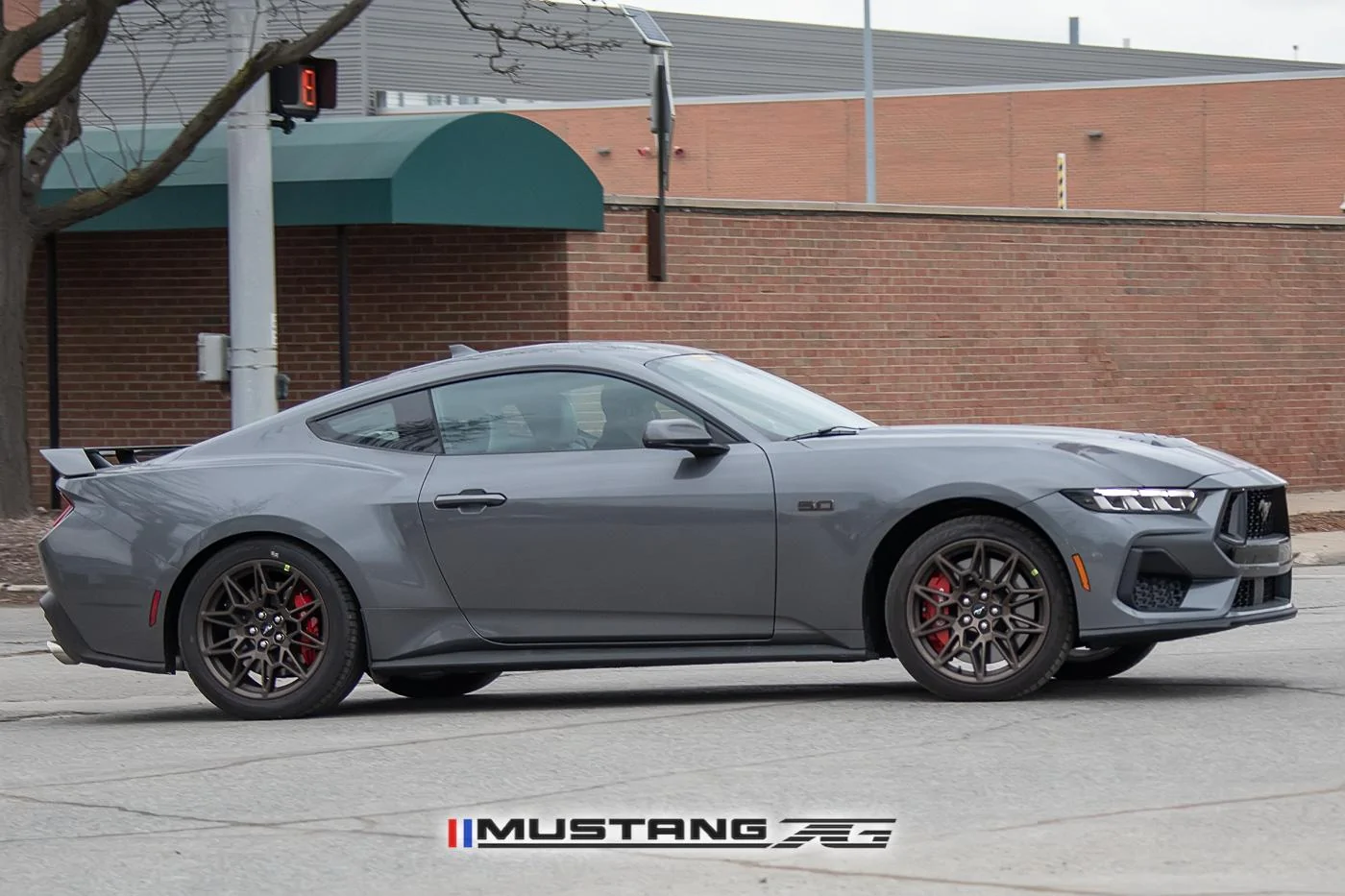2024-mustang-gt-carbonized-gray-bronze-package-black-red-racing-stripes-9.jpg