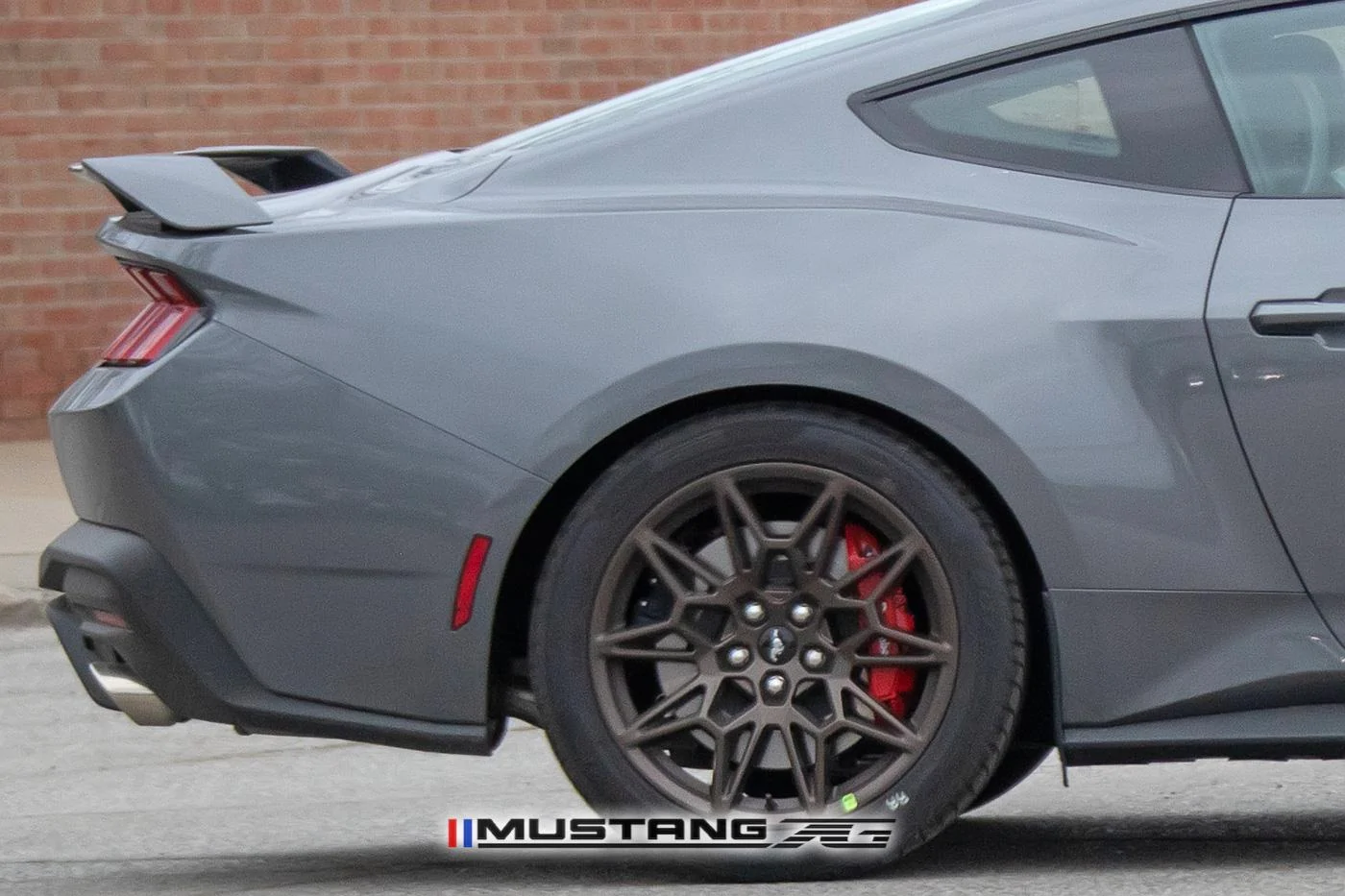 2024-mustang-gt-carbonized-gray-bronze-package-black-red-racing-stripes-13.jpg