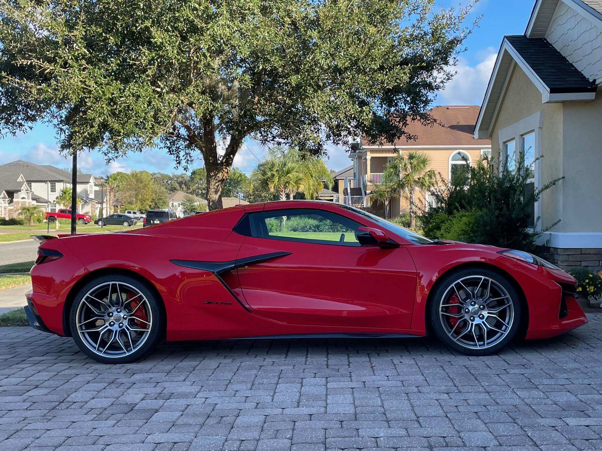 S650 Mustang S650 Red convertible with stripes next to GT350 23 ZO6 HTC