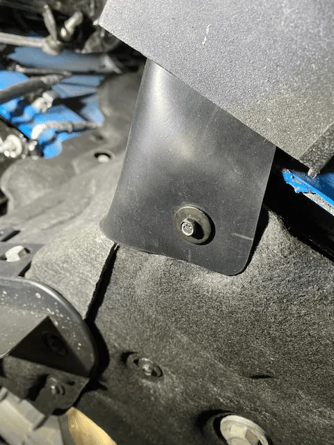 Under Driver Side Attached to 9:32%22 Screw.png