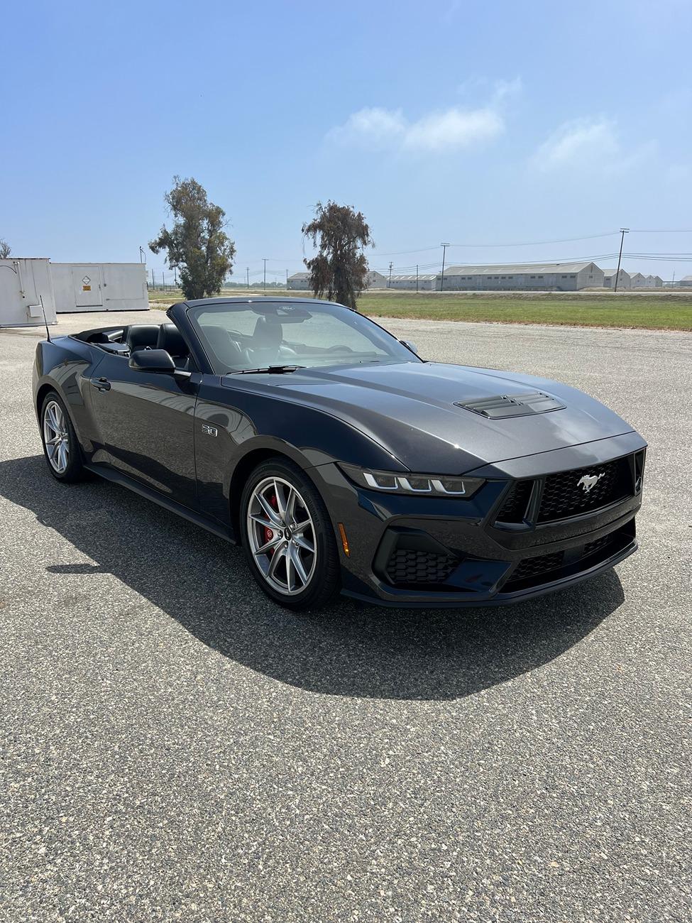 S650 Mustang Bought a new S650 Convertible GT! What are cool exterior mods I can add? Racing stripes? Chin Splitters? Black out wheels? IMG_4512