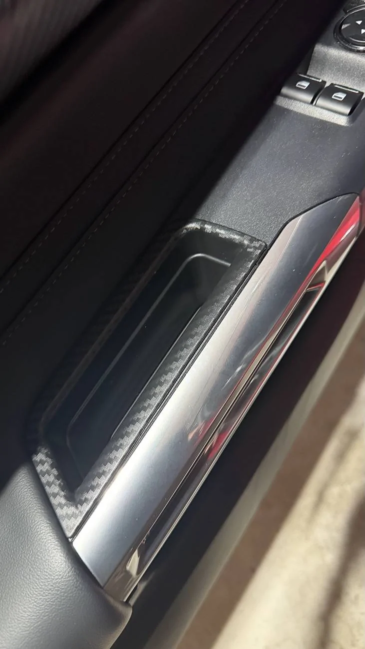 S650 Mustang One of the cheapest, handiest mods you can do in 10 seconds for your interior. Door handle pockets fit and look great! IMG_9861