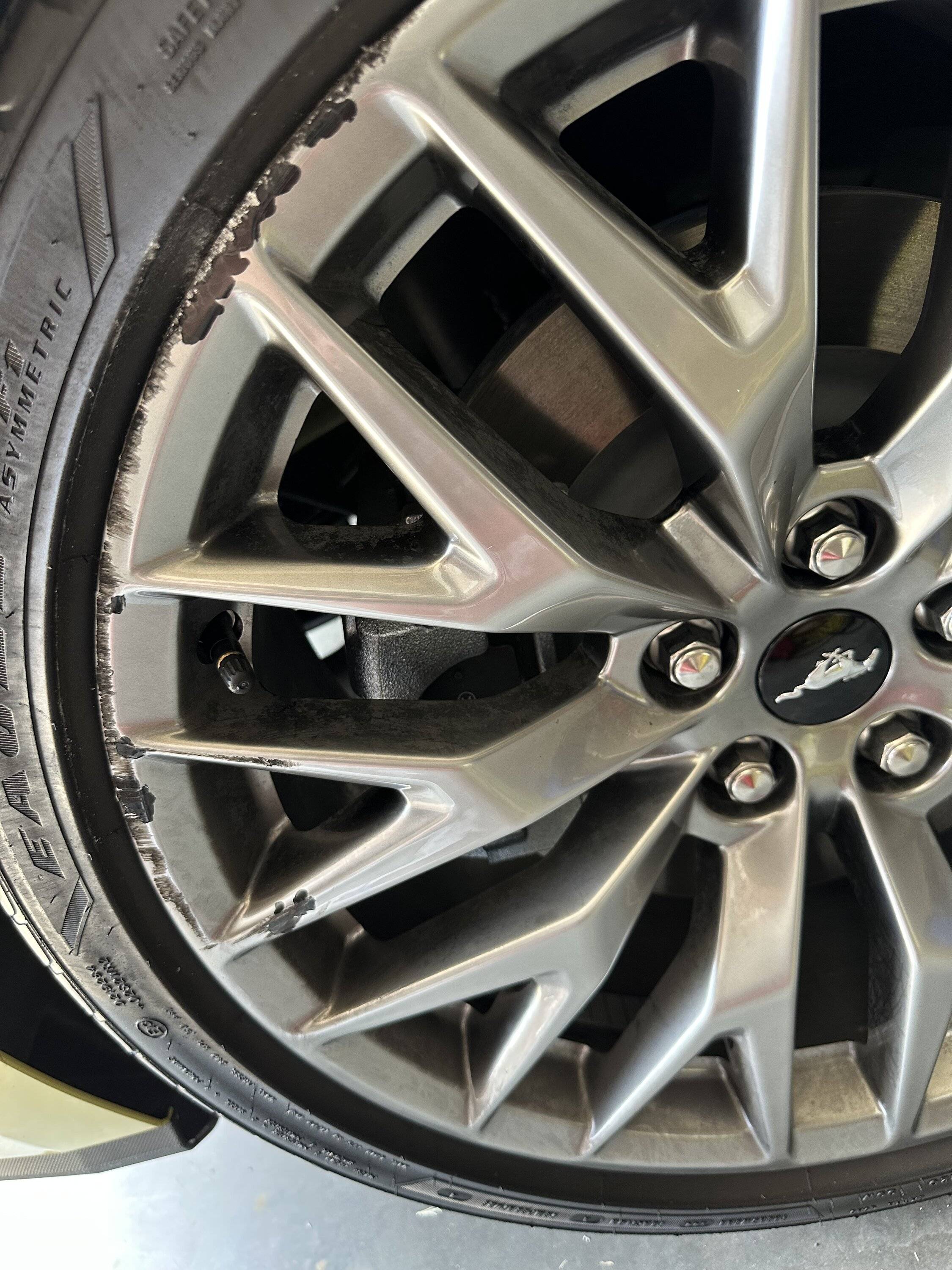 S650 Mustang Scraped my new 20" rim at the local Chick-A-Filet IMG_2799