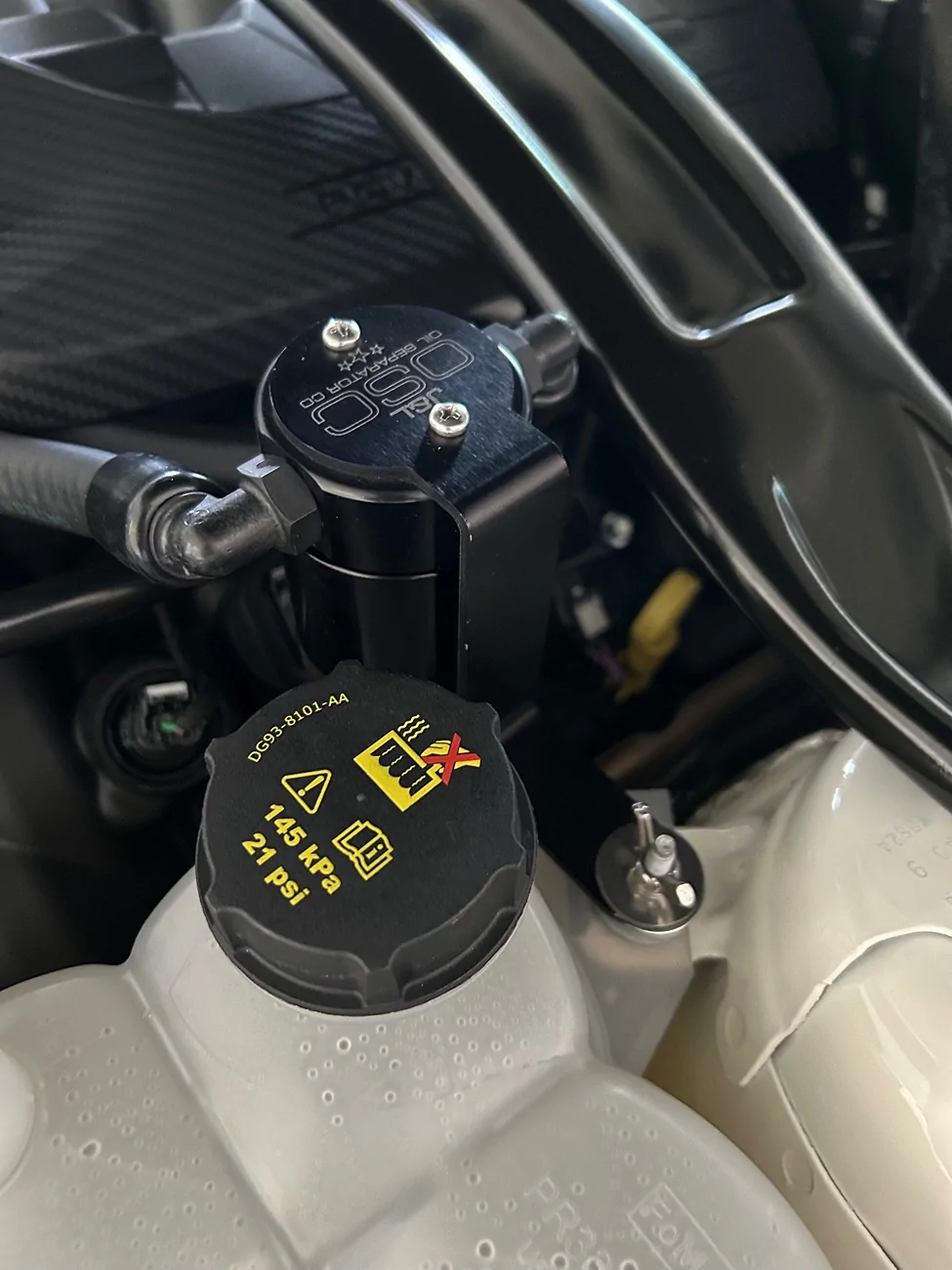 S650 Mustang Removing Oil Dipstick with Ford Performance Strut Tower Brace Above It. IMG_2535