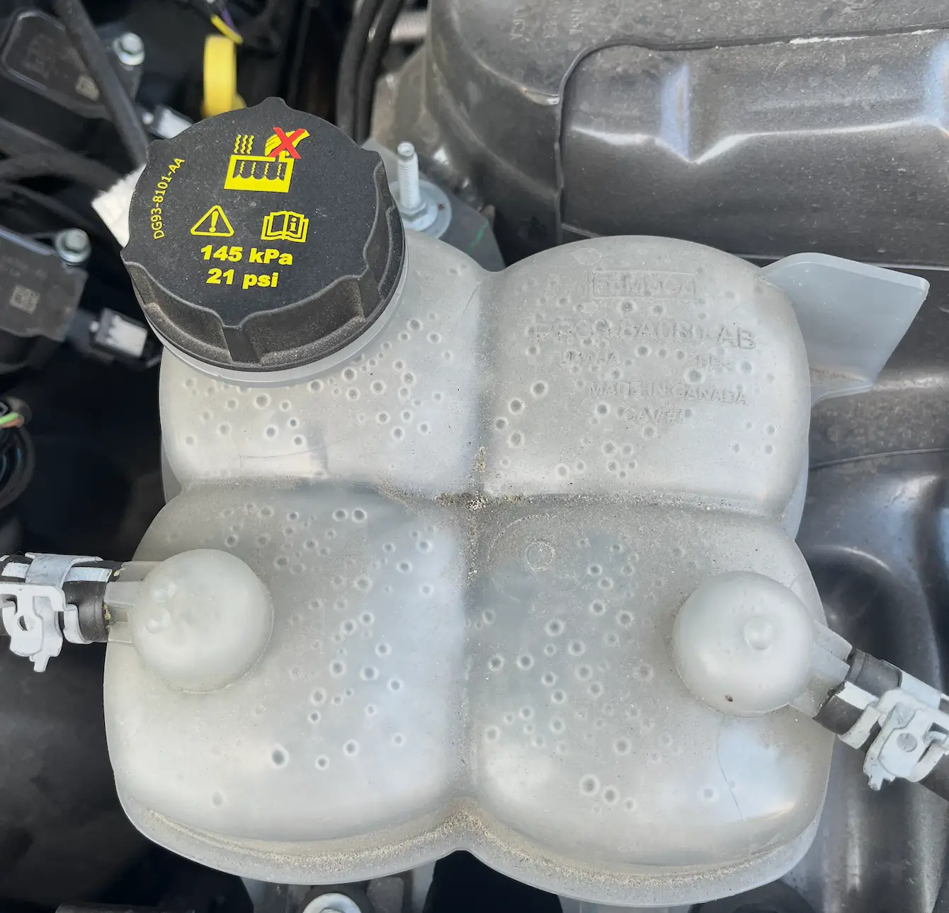 S650 Mustang *not* cracked engine coolant tank lid, it just looks this way Screenshot 2025-12-16 at 8.34.28 AM