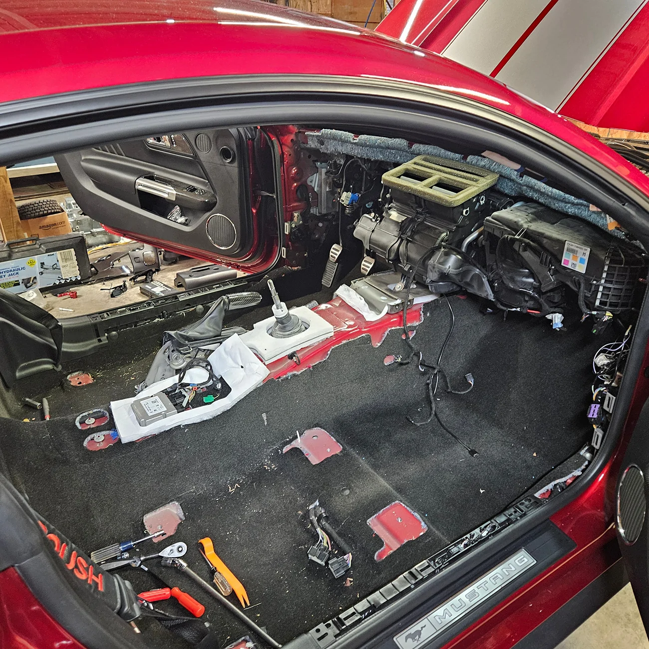 S650 Mustang Where is the stamped VIN number? vin stamp carpet not cut us