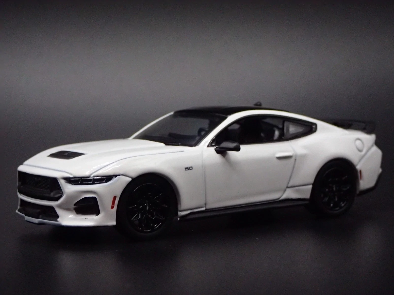 S650 Mustang First S650 2024 Ford Mustang Diecast! 1/18 Dark Horse in Carbonized Gray 1771625989605-uq