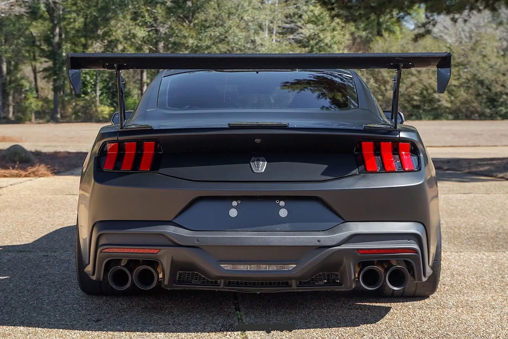 S650 Mustang Anybody wrapped area between tail lights black? 1778812689374-v