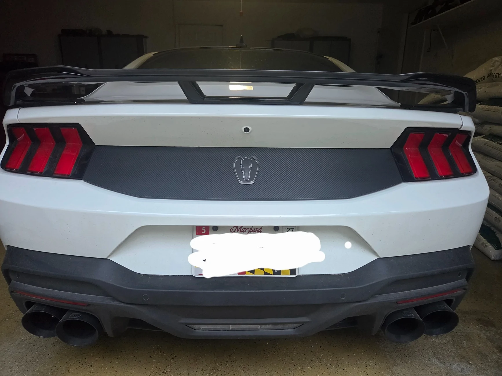 S650 Mustang Anybody wrapped area between tail lights black? 20260515_061637