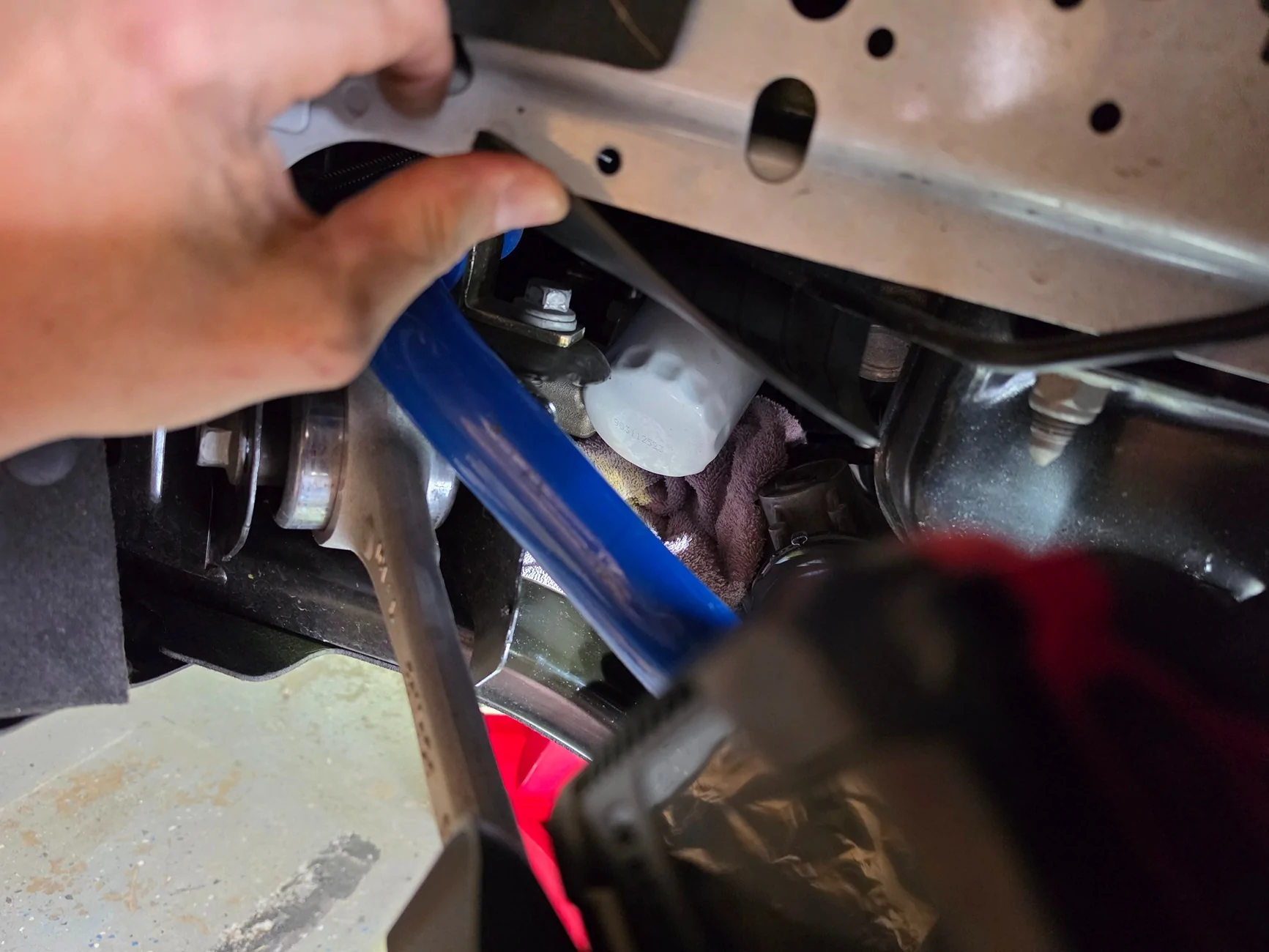 S650 Mustang Changing oil filter through wheel well 922