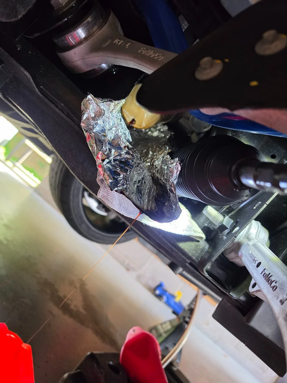 S650 Mustang Changing oil filter through wheel well 925