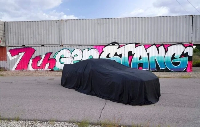 New 7th gen Mustang teaser image with ducktail spoiler under cover!
