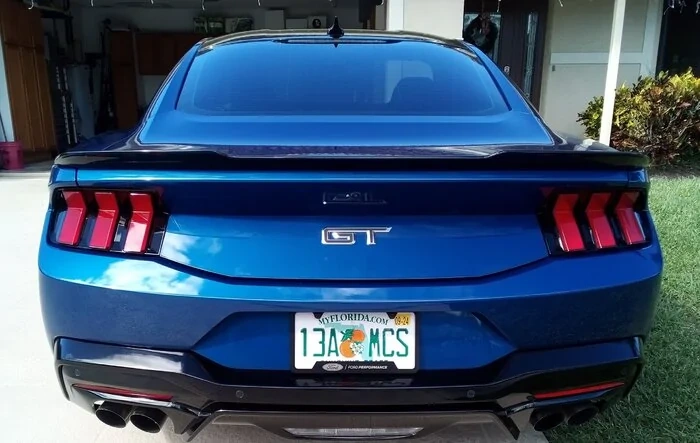 Factory Ford rear deck spoiler just installed! And the gloss black matches the lower gloss trim perfectly.