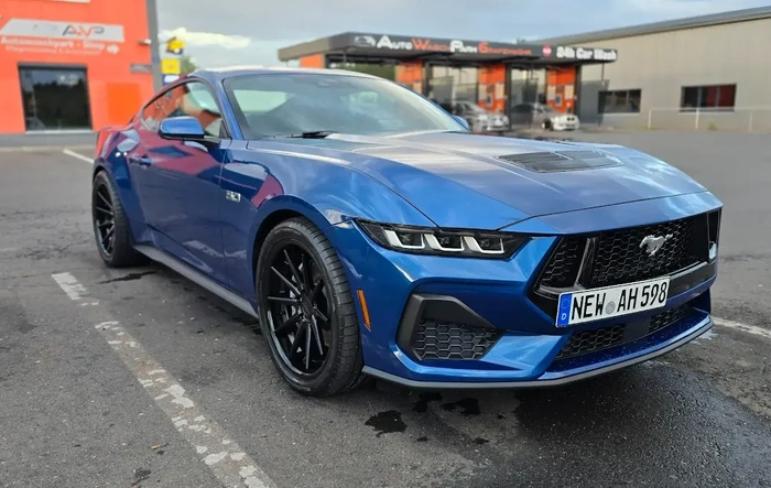 2024 Mustang GT on Ferrada FR4 20x9 wheels, Hankook Ventus R-s4 285/35 tires with Stock Suspension.